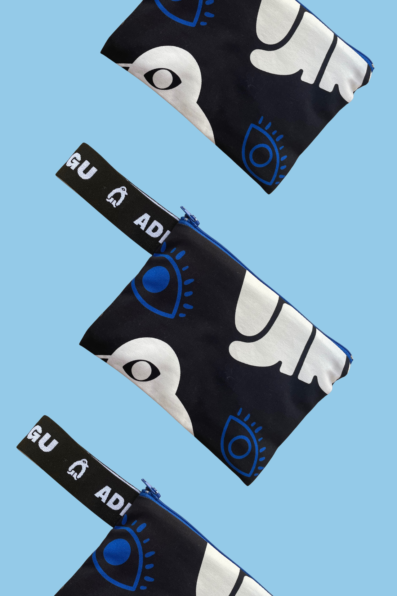 ADELIE MINI POUCH-PENGUINS